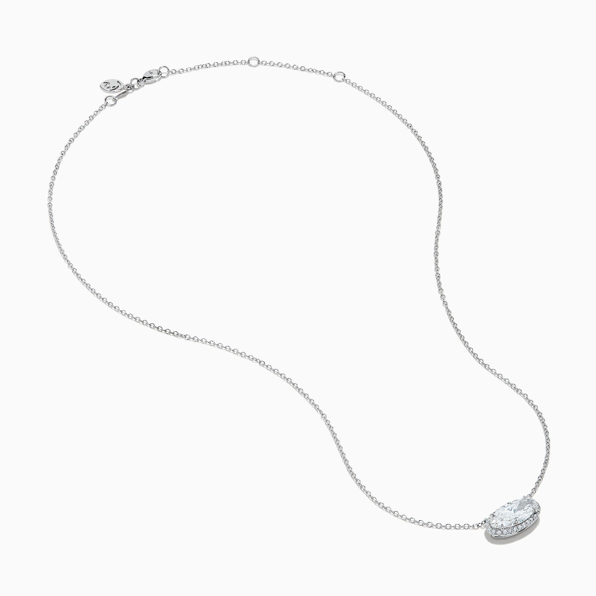 The Lab Grown Diamond East-West Oval Halo Necklace in 14K White Gold showcases a clear lab grown diamond pendant encircled by sparkling stones in an elegant halo setting.