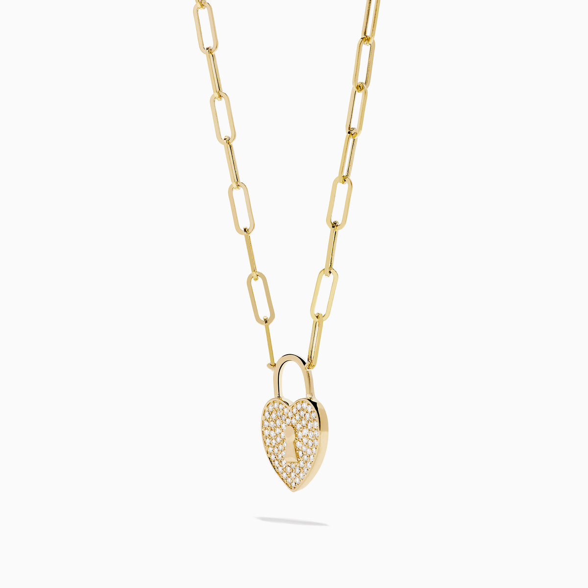 The Novelty 14K Yellow Gold Diamond Heart Lock Pendant is a yellow gold chain necklace with a diamond heart padlock, adorned with sparkling stones and a central keyhole design.