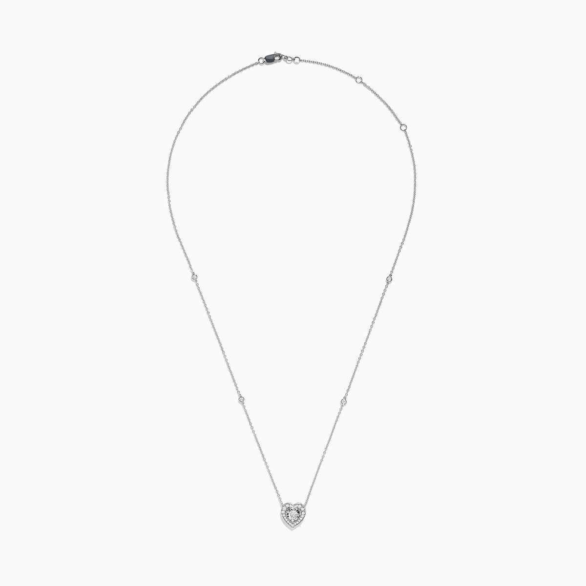 The Pave Classica 14K White Gold Diamond Heart Necklace features a heart-shaped pendant with a central diamond, surrounded by smaller diamonds, and two additional diamonds set along the chain.