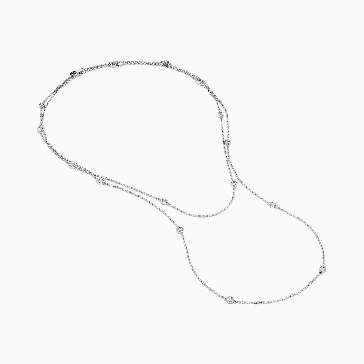 The 925 Sterling Silver Diamond 36 Inch Station Necklace features five small round diamonds evenly spaced along a delicate sterling silver chain, shown on a plain white background.