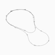 The 925 Sterling Silver Diamond 36 Inch Station Necklace features five small round diamonds evenly spaced along a delicate sterling silver chain, shown on a plain white background.