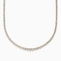 The Duo 14K Two-Tone Gold Diamond Tennis Necklace 2.94 TCW features a continuous row of round white diamonds that gradually increase in size toward the center, set in delicate two-tone gold.