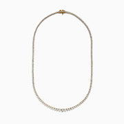 The Duo 14K Two-Tone Gold Diamond Tennis Necklace 2.94 TCW features a continuous row of round white diamonds that gradually increase in size toward the center, set in delicate two-tone gold.