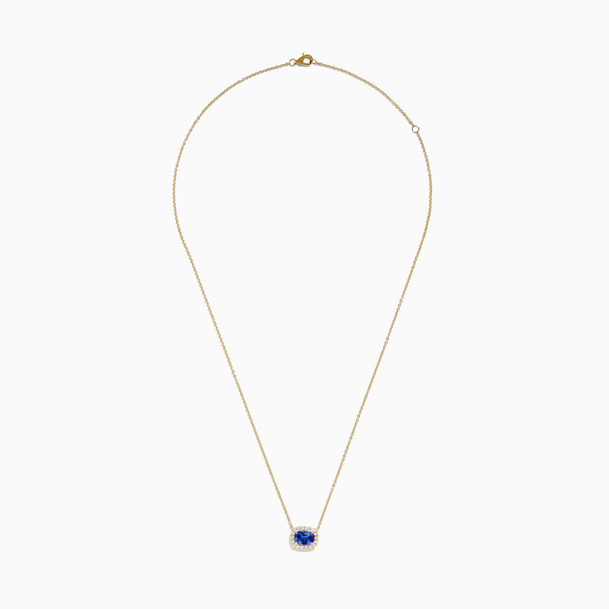 The Nahla 14K White Gold Tanzanite and Diamond Halo Necklace features a central blue oval tanzanite gemstone encircled by diamonds, shown on a white background.