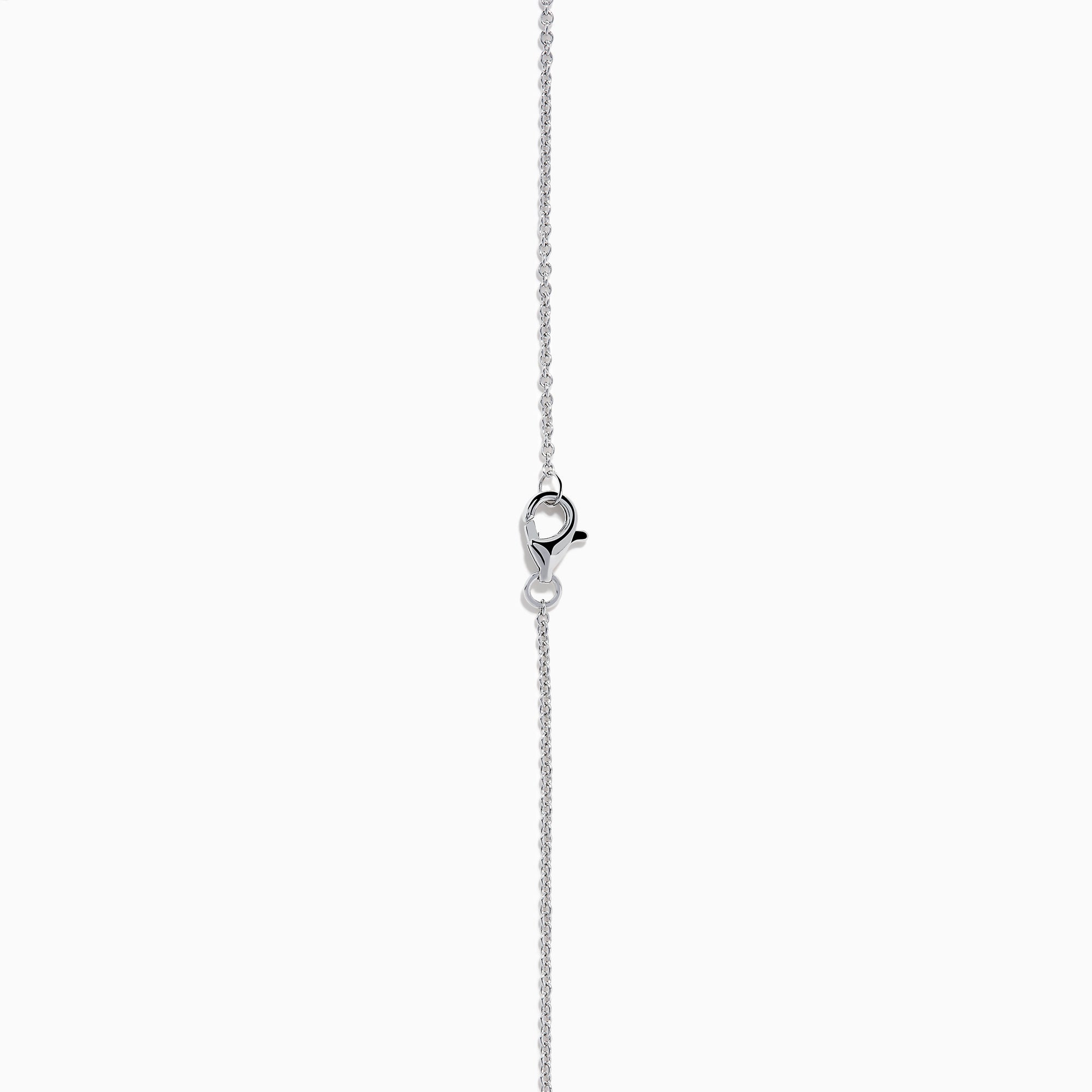 The Nahla 14K White Gold Tanzanite and Diamond Halo Necklace features a round blue tanzanite pendant encircled by sparkling diamonds on a delicate silver chain, creating an elegant look against a plain white background.