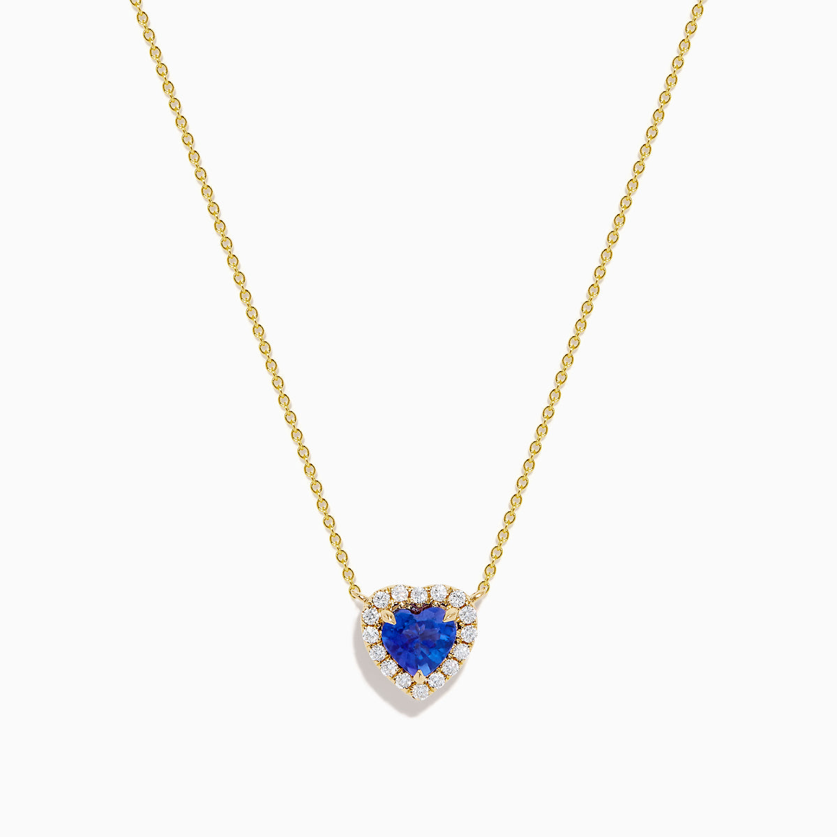 The Nahla 14K Yellow Gold Heart Tanzanite and Diamond Necklace features a heart-shaped blue tanzanite pendant accented with sparkling diamonds.