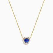 The Nahla 14K Yellow Gold Heart Tanzanite and Diamond Necklace features a heart-shaped blue tanzanite pendant accented with sparkling diamonds.
