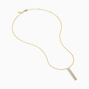 The D'Oro 14K Yellow Gold Diamond Bar Lariat Necklace features a vertical rectangular pendant set with square-cut white gemstones for a modern, elegant look.