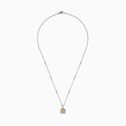 The Canare 18K Two Tone Gold White and Yellow Diamond Necklace features a square pendant with yellow and white diamonds, bordered by smaller white stones, hanging from a delicate chain set with round gemstones.