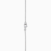 The Canare 18K Two Tone Gold White and Yellow Diamond Necklace features a square pendant with yellow and white diamonds, bordered by smaller white stones, hanging from a delicate chain set with round gemstones.