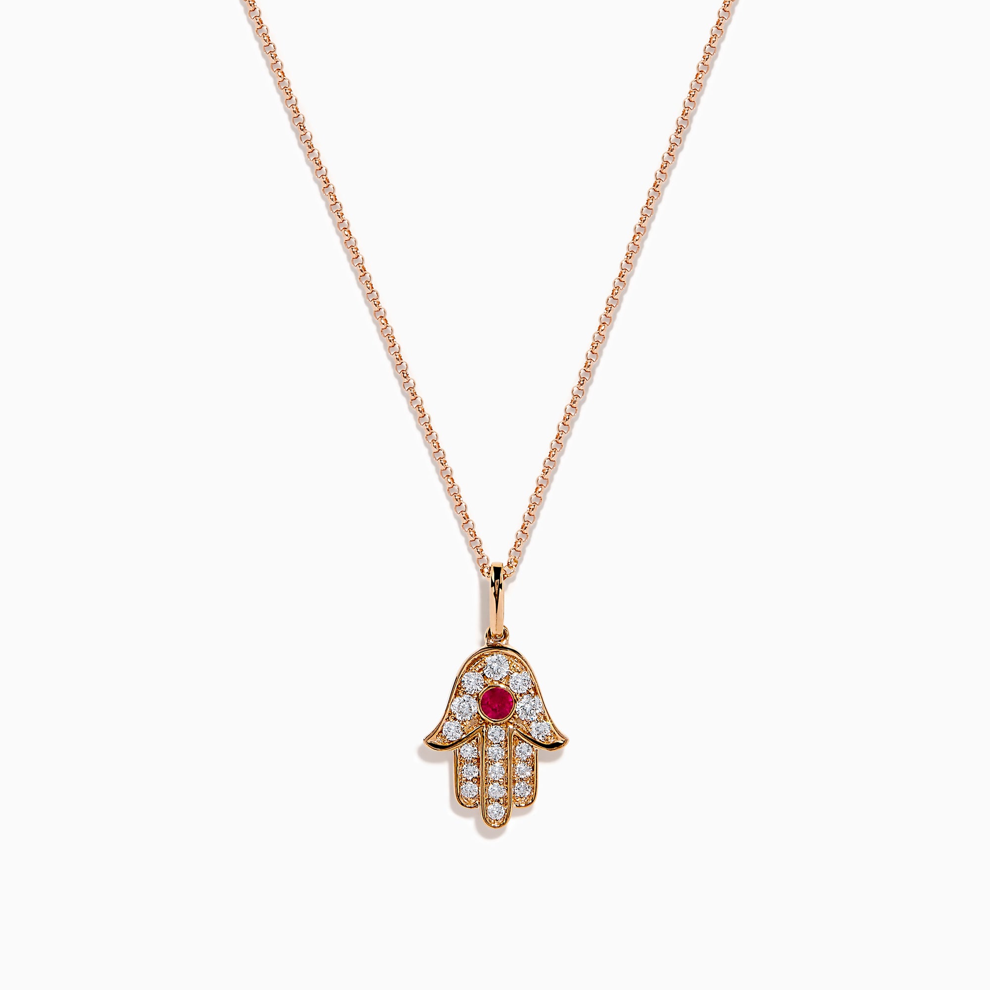 The Ruby Royale 14K Rose Gold Diamond and Ruby Hamsa Pendant features sparkling diamonds and a central ruby, showcased elegantly against a white background.