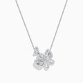 The Nature 14K White Gold Diamond Flower Necklace features sparkling diamonds in a flower-shaped pendant with intricate detailing on a fine chain, elegantly displayed on a white background.