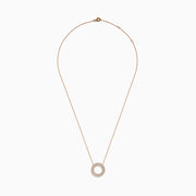 The Pave Rose 14K Rose Gold Diamond Circle Necklace showcases a circular pendant with two concentric rows of sparkling diamonds, shown on a white background.