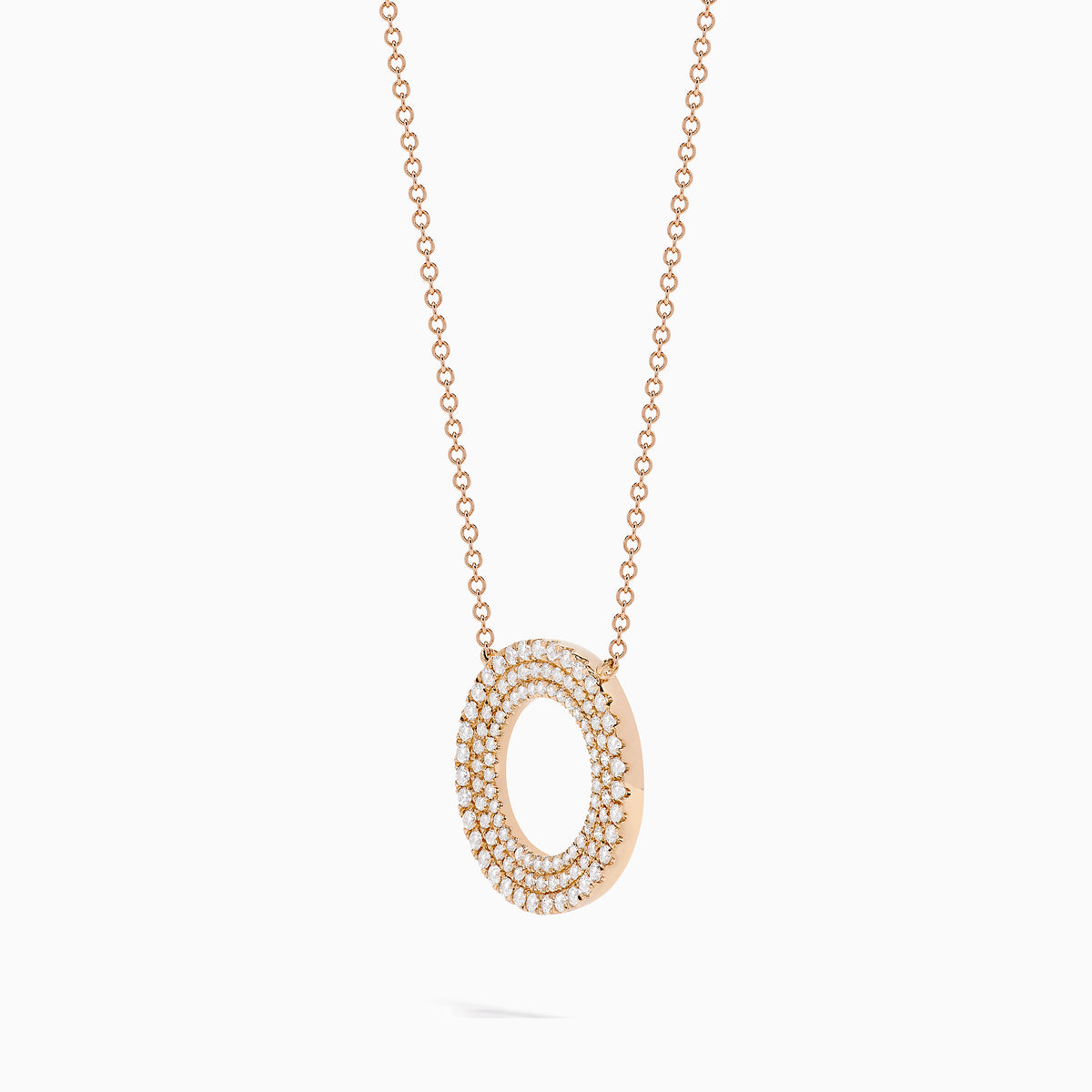 The Pave Rose 14K Rose Gold Diamond Circle Necklace showcases a circular pendant with two concentric rows of sparkling diamonds, shown on a white background.