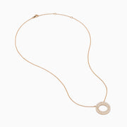The Pave Rose 14K Rose Gold Diamond Circle Necklace showcases a circular pendant with two concentric rows of sparkling diamonds, shown on a white background.