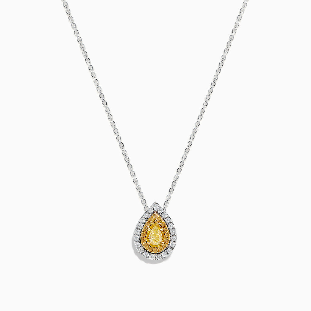 The Canare 14K Two-Tone Gold Pendant showcases a pear-shaped yellow diamond, accented with a halo of white diamonds, hanging from a delicate silver chain.