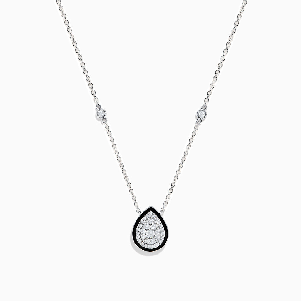 The Pave Classica 14K White Gold Diamond and Enamel Necklace features a teardrop diamond pendant bordered with black enamel and two small round diamonds on the chain, set against a white background.