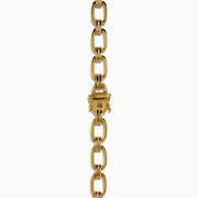 The 14K Yellow Gold Chain Link Necklace with Diamond Accents features oval links joined by sections set with clear diamonds, forming a symmetrical, elegant design.