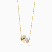 The Novelty 14K Yellow Gold Diamond Mama Heart Necklace features two pendants: one engraved with mama and a smaller, diamond-accented heart—an ideal gift to celebrate love and motherhood.