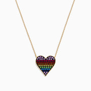 The Watercolors 14K Yellow Gold Multi Color Sapphire Heart Necklace features a gold chain and a heart-shaped pendant adorned with rainbow sapphires arranged from purple to blue.