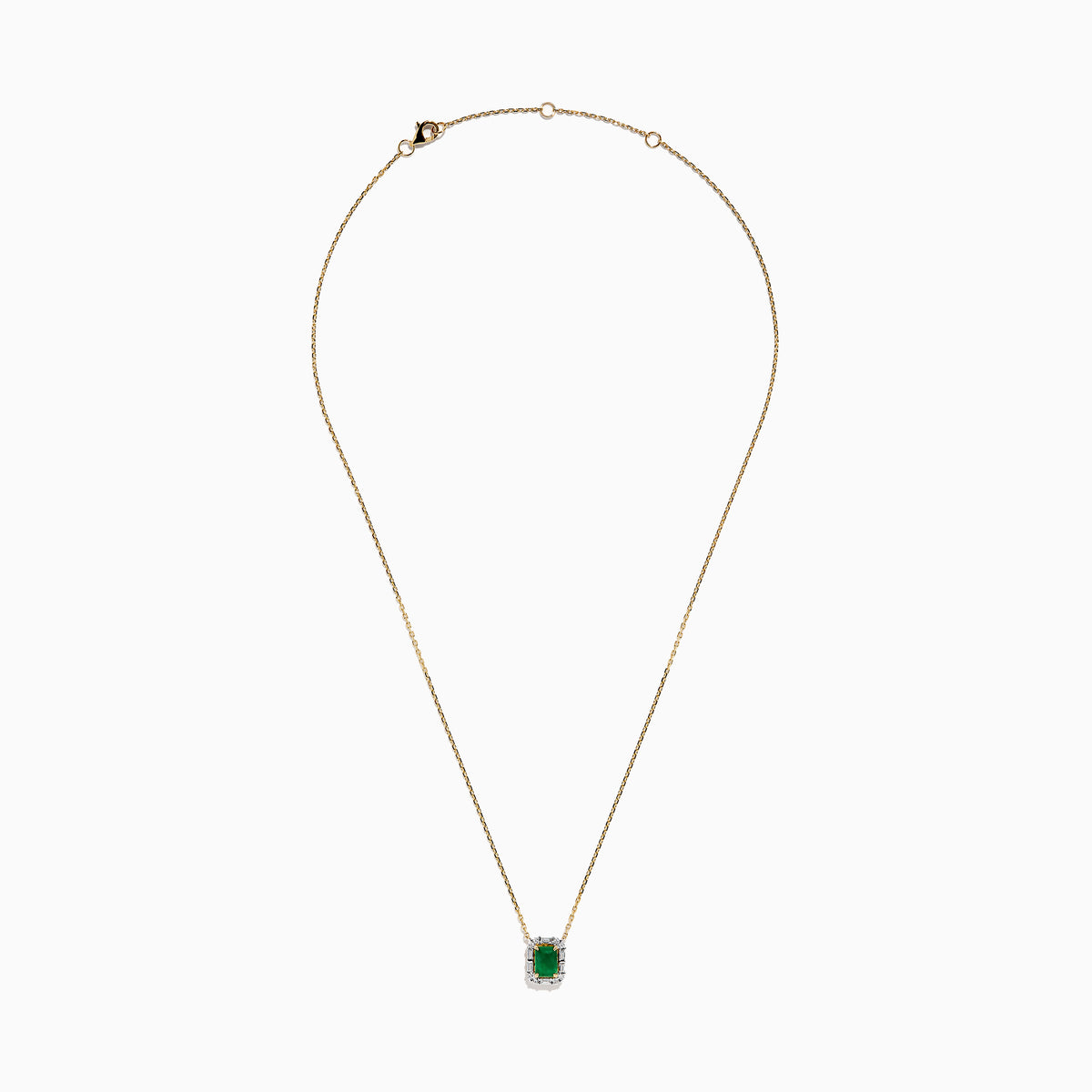 The Brasilica 14K Yellow Gold Emerald and Diamond Necklace features a rectangular emerald pendant accented with diamonds, shown on a white background.