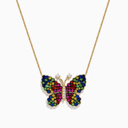 The Watercolors 14 Karat Yellow Gold Multi Sapphire Butterfly Necklace features a pendant set with blue, green, yellow, and pink sapphires, plus two diamond-like accents on the butterfly’s antennae.