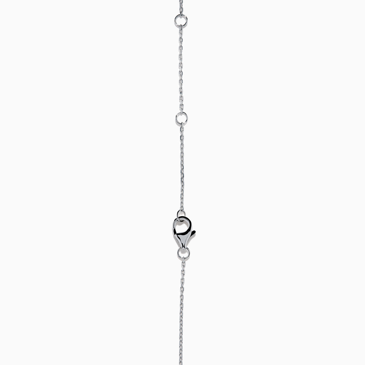 The Novelty 14K White Gold Multi Shape Diamond Heart Necklace features a heart pendant outlined with sparkling diamonds in various shapes, all set in elegant 14K white gold.