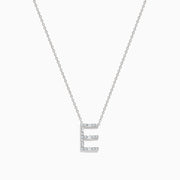 The 14K White Gold Diamond Initial E Pendant necklace, featuring sparkling diamonds, is displayed on a white background.