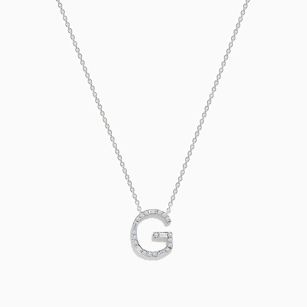 The 14K White Gold Diamond Initial G Pendant features a delicate white gold chain and a sparkling diamond-adorned G pendant, creating an elegant contrast against the plain white background.