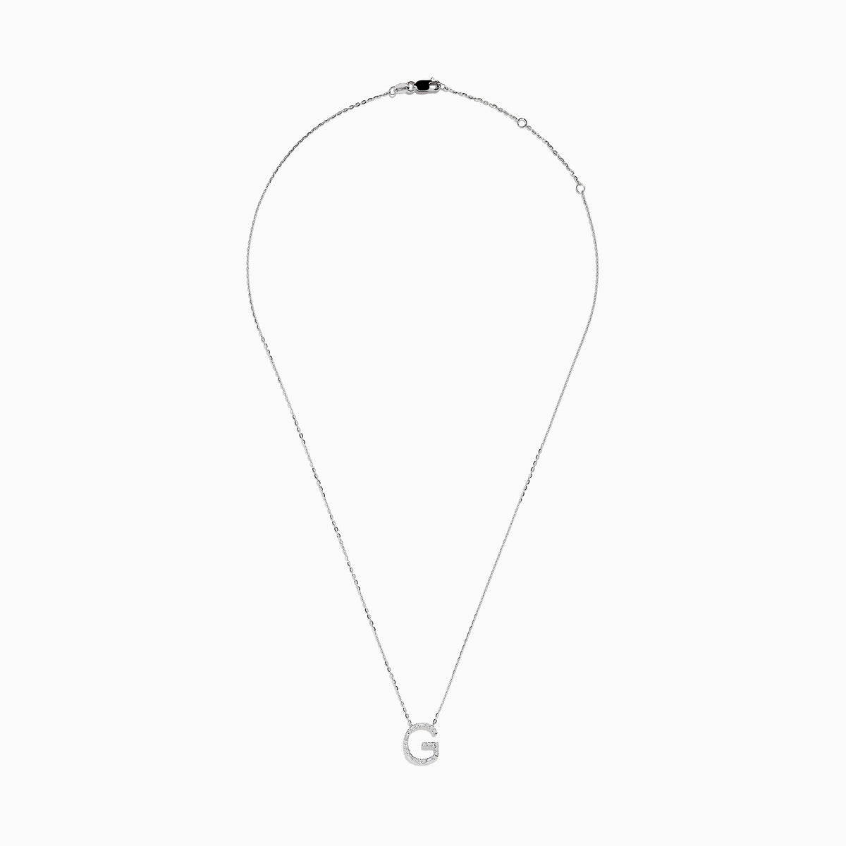 The 14K White Gold Diamond Initial G Pendant features a delicate white gold chain and a sparkling diamond-adorned G pendant, creating an elegant contrast against the plain white background.