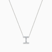 The 14K White Gold Diamond Initial I Pendant features a delicate white gold chain and is adorned with sparkling diamonds.