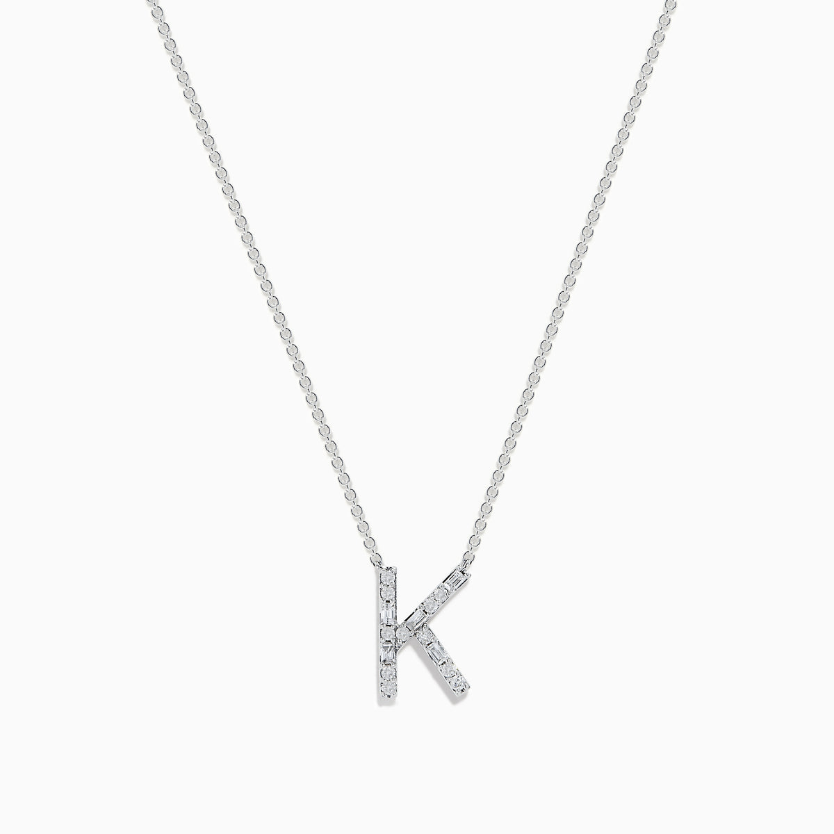 A 14 Karat White Gold Initial K Diamond Necklace featuring a sparkling diamond-encrusted K pendant on a delicate chain.