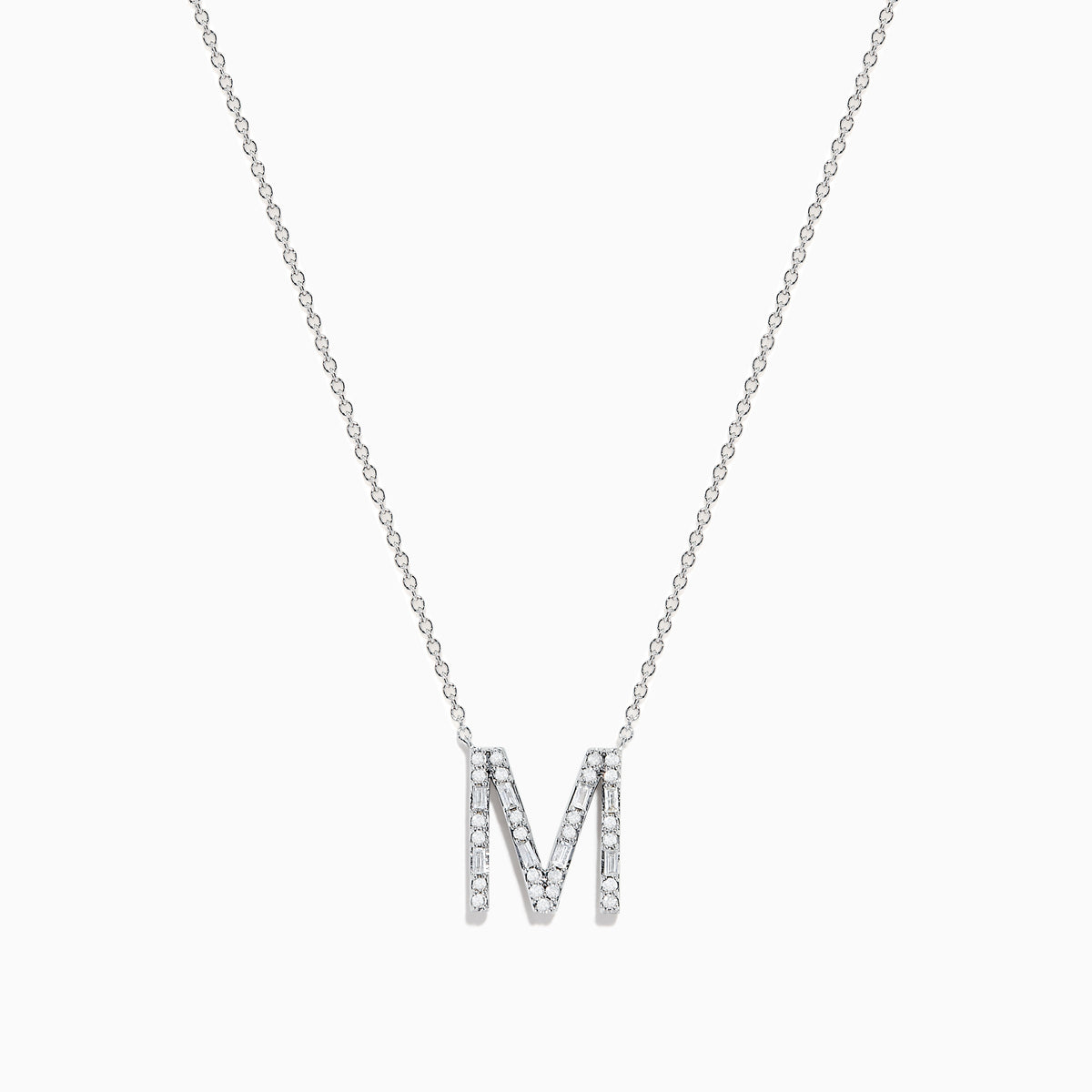 The 14K White Gold Diamond Initial M Pendant features a delicate white gold chain and a sparkling diamond-studded M pendant, displayed against a plain white background.
