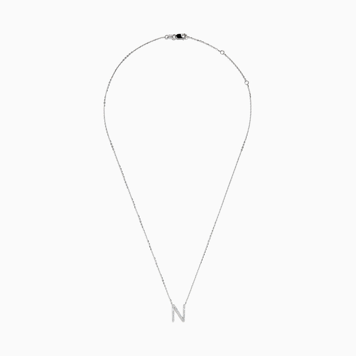 The 14K White Gold Diamond Initial N Pendant features a delicate white gold chain and a sparkling diamond-studded N, showcased on a plain white background.