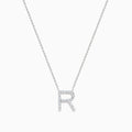 A 14K white gold Effy pendant in the shape of the letter R, set with sparkling diamonds for a refined, elegant touch.