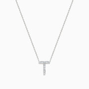 The 14K White Gold Diamond Initial T Pendant features a delicate white gold chain and sparkling diamonds, showcased against a plain white background.