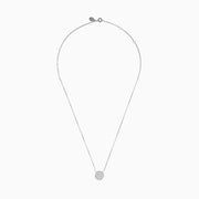 The Pave Classica 14K White Gold Diamond Disc Necklace features a round pendant encrusted with sparkling pave diamonds, elegantly displayed on a delicate white gold chain against a white background.