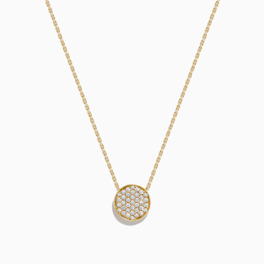 The D'Oro 14K Yellow Gold Diamond Disc Necklace features a dazzling round pendant set with sparkling diamonds, making it a stunning addition to your diamond necklace collection.