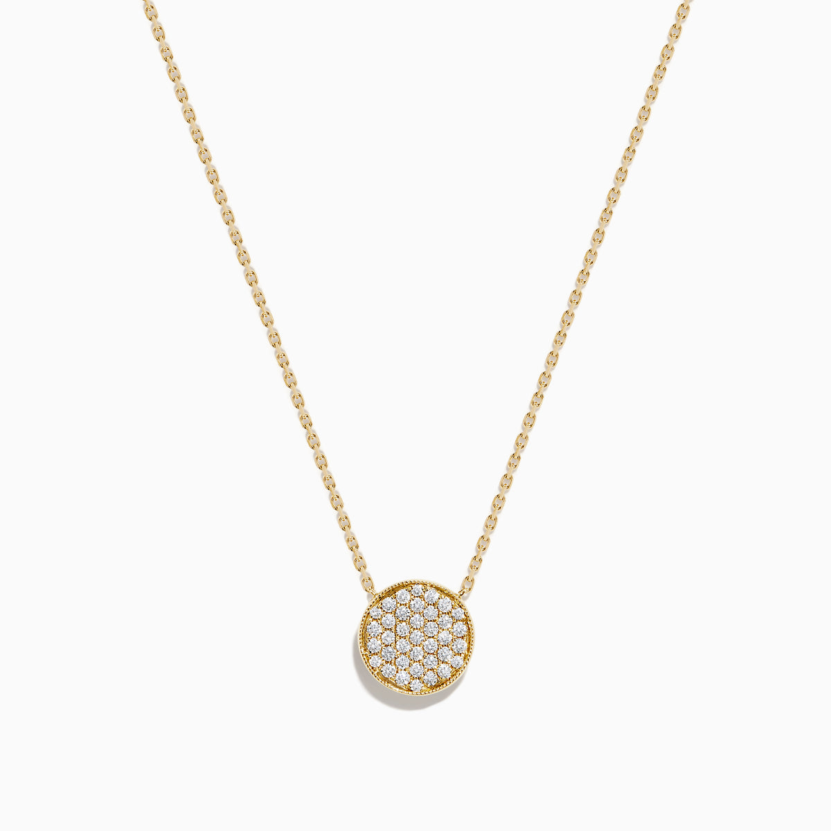 The D'Oro 14K Yellow Gold Diamond Disc Necklace features a dazzling round pendant set with sparkling diamonds, making it a stunning addition to your diamond necklace collection.