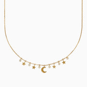 The Novelty 14K Yellow Gold Diamond Moon and Stars Necklace features five star charms, a central crescent moon, and three diamond accents on a fine gold chain, displayed against a white background.