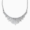 The 14K White Gold Diamond Fringe Necklace features a fan-like design with vertical bars accented by round and rectangular diamonds, creating an elegant, radiant look.