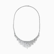 The 14K White Gold Diamond Fringe Necklace features a fan-like design with vertical bars accented by round and rectangular diamonds, creating an elegant, radiant look.