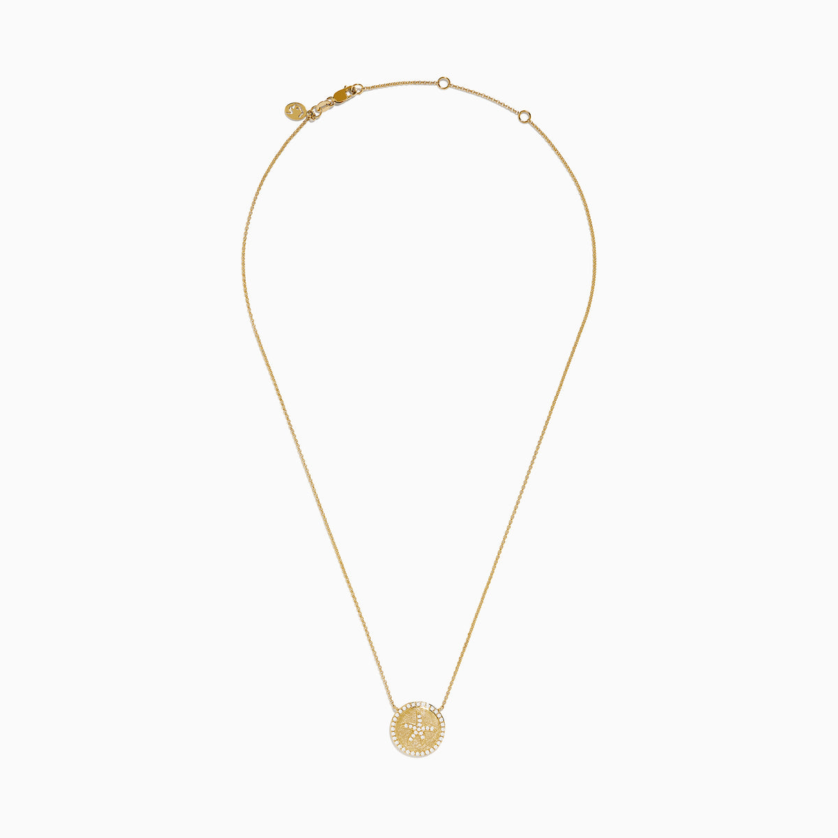 The Seaside 14K Yellow Gold Diamond Starfish Necklace showcases a round, textured pendant with a central starfish design, elegantly outlined and adorned with sparkling diamonds along the edge.
