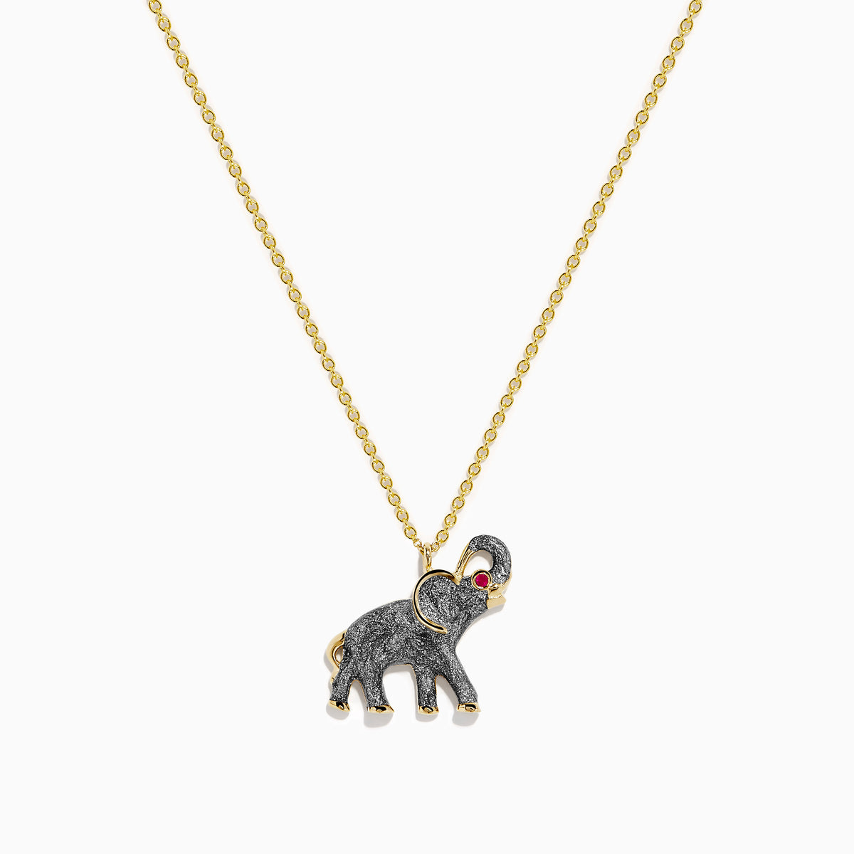 The 14K Yellow Gold Enamel Elephant Necklace features a yellow gold chain and an elephant pendant with a textured dark gray enamel body, gold accents, and a small red gemstone eye.