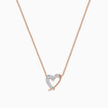 The 14K Rose Gold Diamond Open Heart Necklace features a heart-shaped pendant half encrusted with diamonds, suspended from a fine chain and displayed on a plain white background.