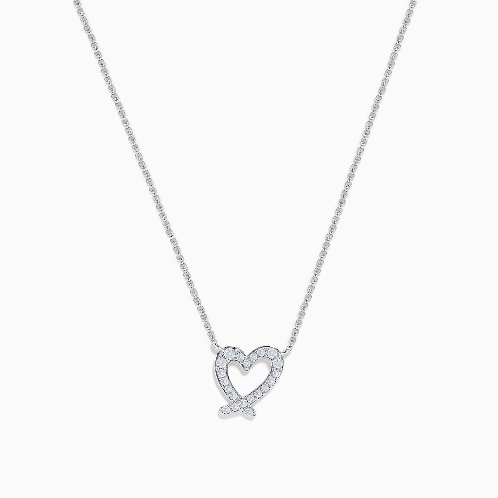 The 14K White Gold Diamond Open Heart Necklace showcases a heart-shaped pendant adorned with diamonds, elegantly suspended from a fine chain against a white background.