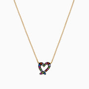 The Watercolors 14K Yellow Gold Multi Sapphire Open Heart Necklace features a heart-shaped pendant outlined with multicolored sapphires, shown against a white background.