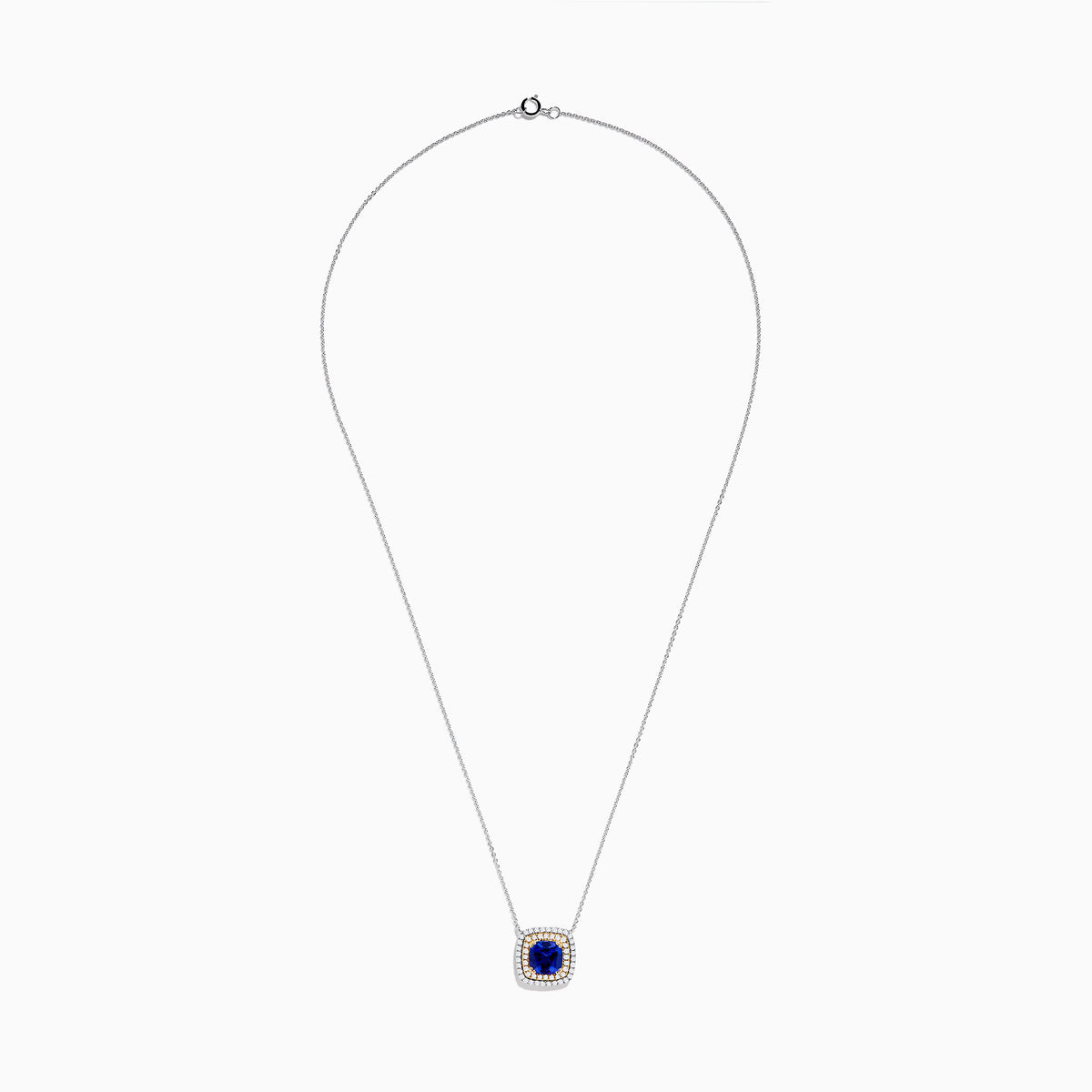 The Nahla Siri 14K Two Tone Gold Tanzanite and Diamond Necklace features a square pendant with deep blue tanzanite, framed by a double halo of sparkling diamonds in silver and gold tones.