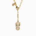 The Signature 14K Yellow Gold Diamond and Emerald Panther Necklace features a panther head pendant with diamond accents, emerald eyes, a circular ring in its mouth, an elongated link chain, and a small charm near the clasp.