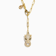 The Signature 14K Yellow Gold Diamond and Emerald Panther Necklace features a panther head pendant with diamond accents, emerald eyes, a circular ring in its mouth, an elongated link chain, and a small charm near the clasp.